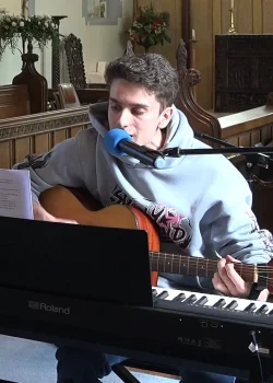 Karl Singing and Playing